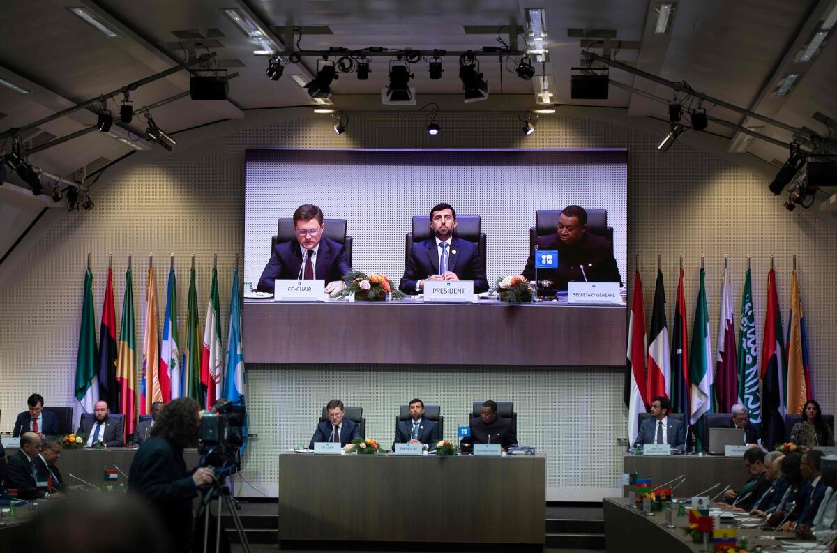 Russian Minister of Energy of Russia Alexander Novak, left, with Organization of the Petroleum Exporting Countries President UAE Energy Minister Suhail al-Mazroueiand and OPEC Secretary General Mohammed Sanusi Barkindo of Nigeria during the organization's 2018 meeting in Vienna, Austria.