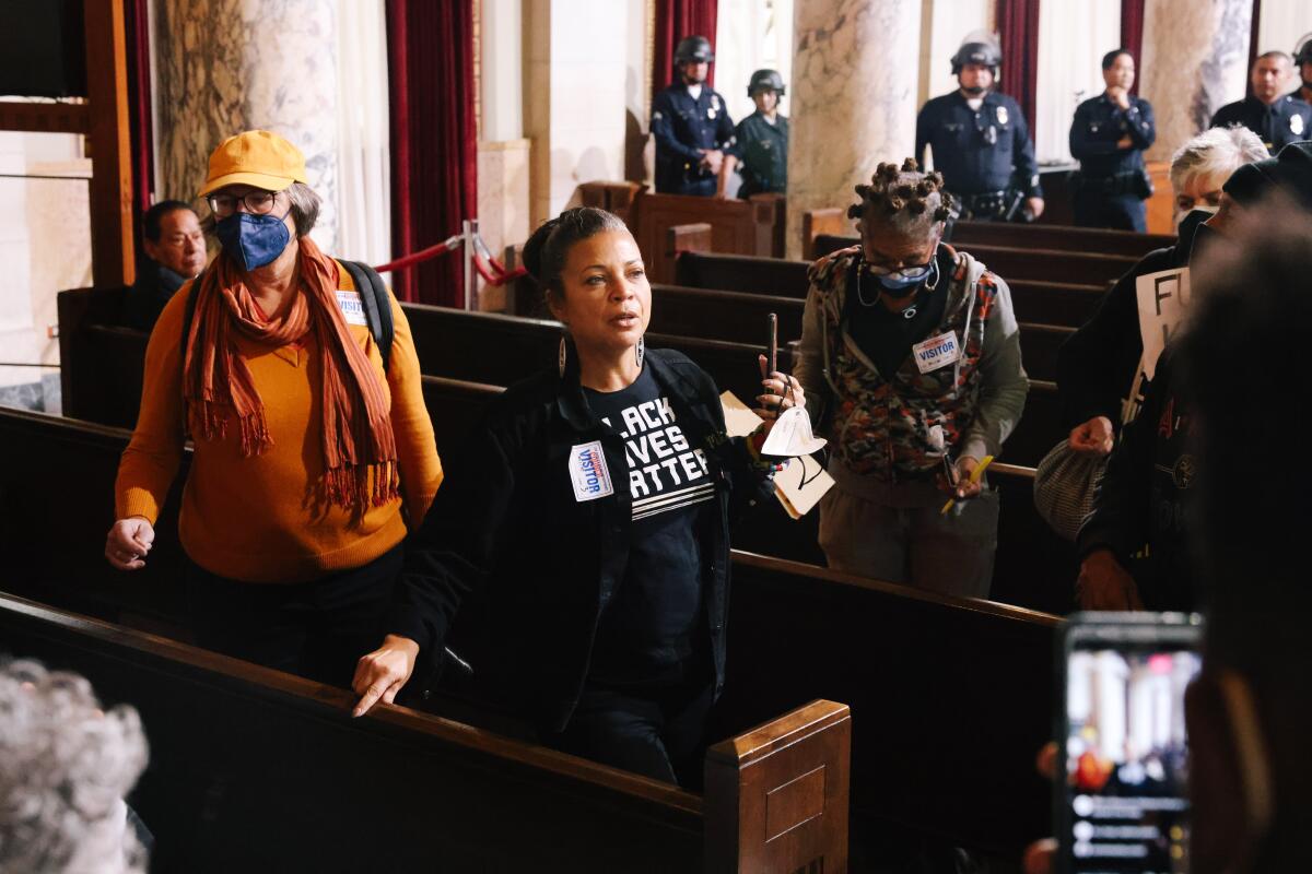 Melina Abdullah, leader of Black Lives Matter-Los Angeles, speaks to activists at Los Angeles City Hall in November.
