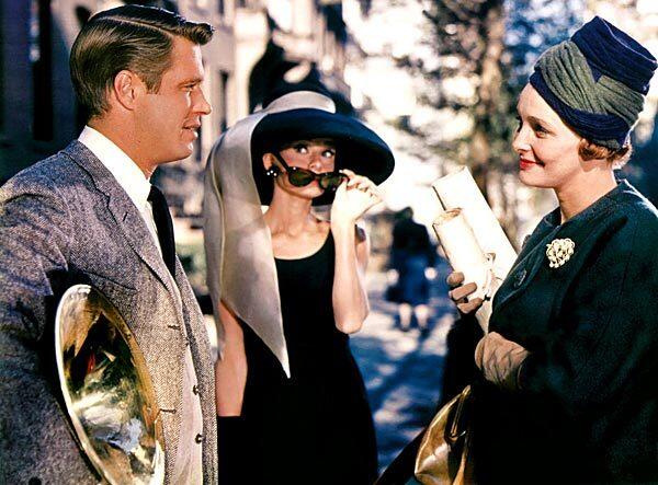 George Peppard, Audrey Hepburn and Patricia Neal in a scene from 1961's "Breakfast at Tiffany's." See full story