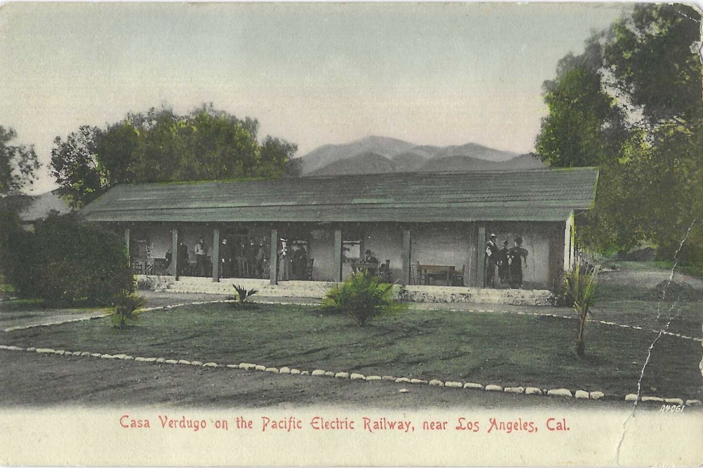 The front of a vintage Casa Verdugo postcard