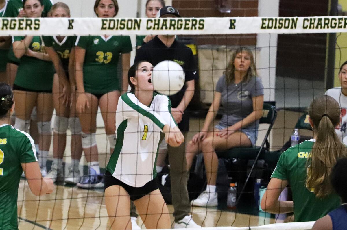 Edison's Sammy Wood (1) receives a serve against Vista Murrieta on Saturday.