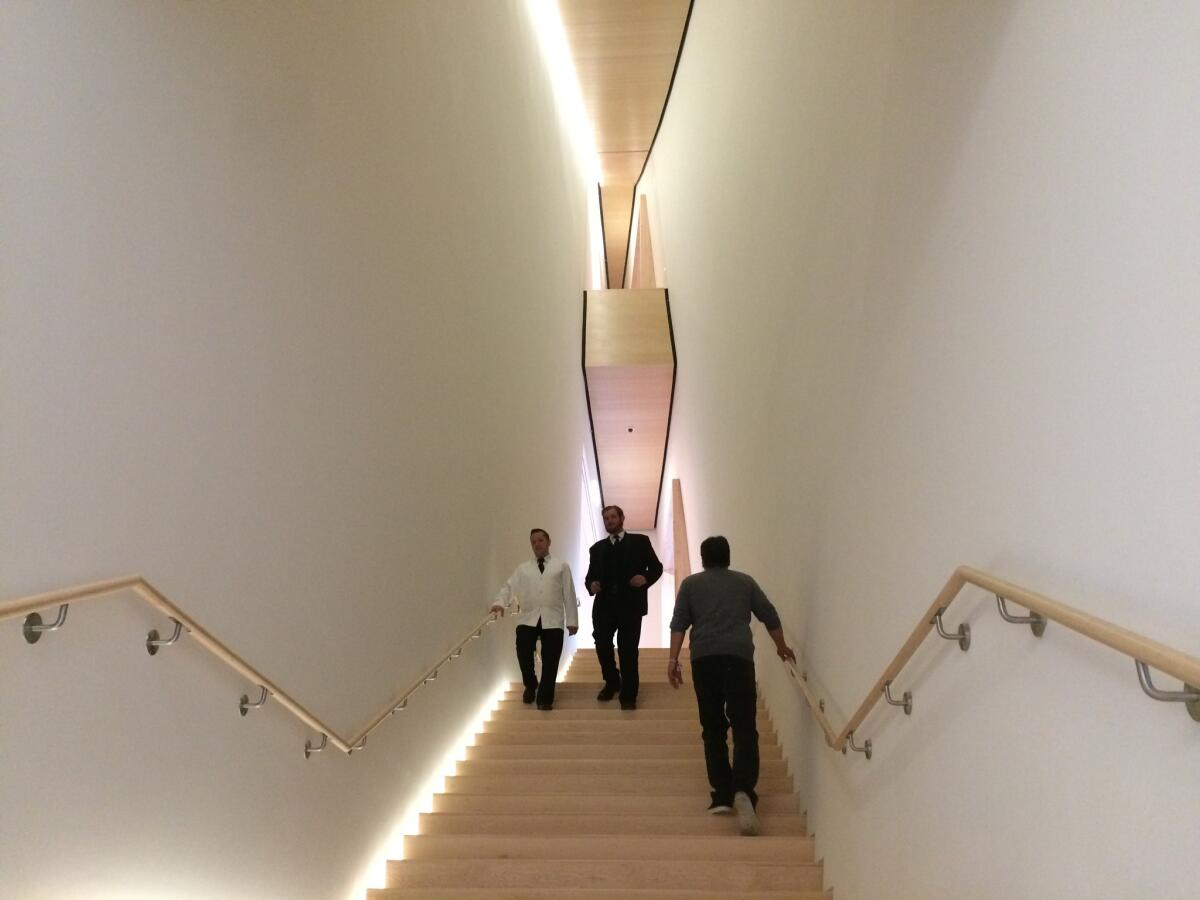 The staircases in the new wing hug the building's undulating form, making for an experience that takes on varying geometries that narrow as you ascend. "Each stair is different," said Snohetta founding architect Craig Dykers at the preview. "Take the stairs, please!"
