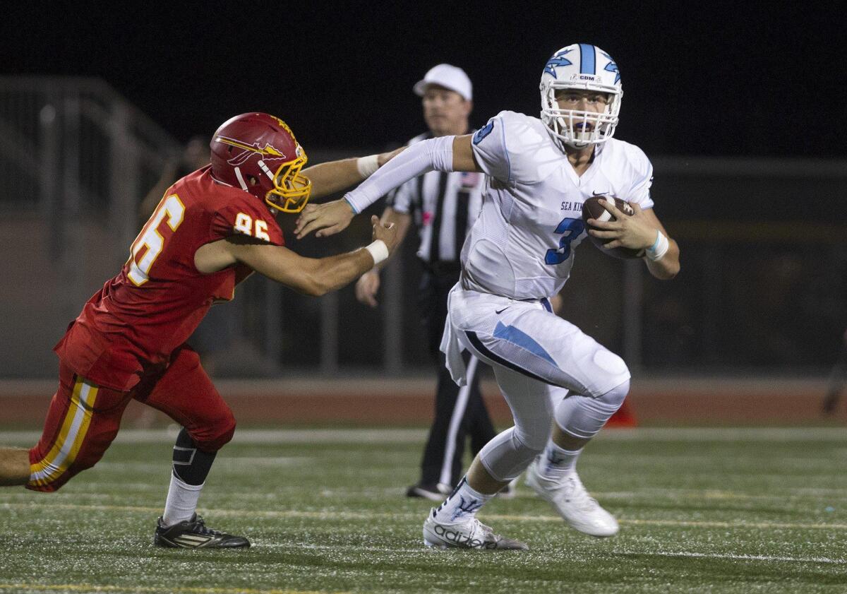 Chase Garbers, right, who will be a senior at Corona del Mar High next fall, has become one of the top quarterbacks in California.