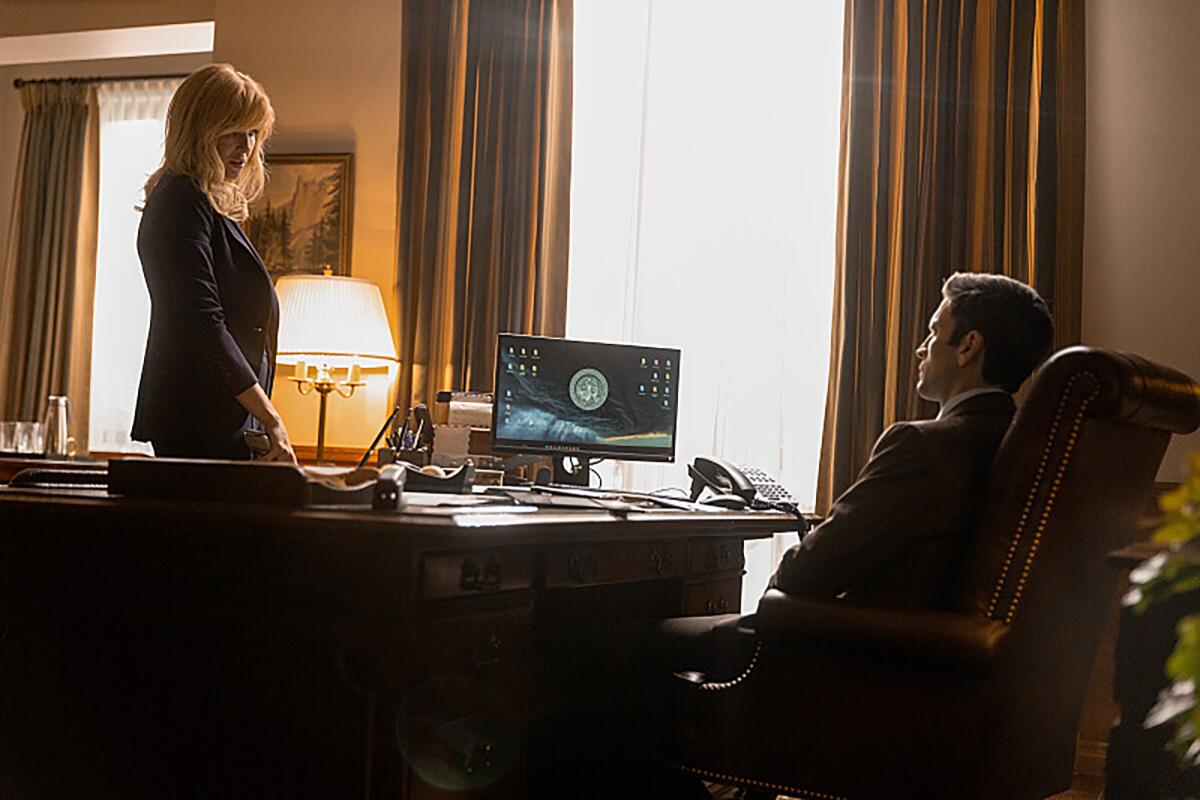Kelly Reilly, left, and Wes Bentley in "Yellowstone."