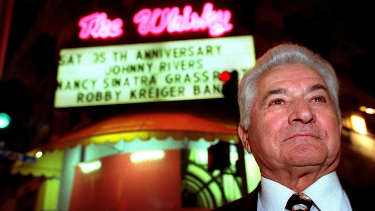 Mario Maglieri, who died Thursday at 93, stands outside the Whisky a Go Go during its 35th anniversary celebration in 1999.