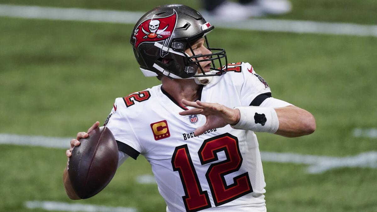 Tampa Bay Buccaneers quarterback Tom Brady warms up before playing the Atlanta Falcons on Dec. 20.