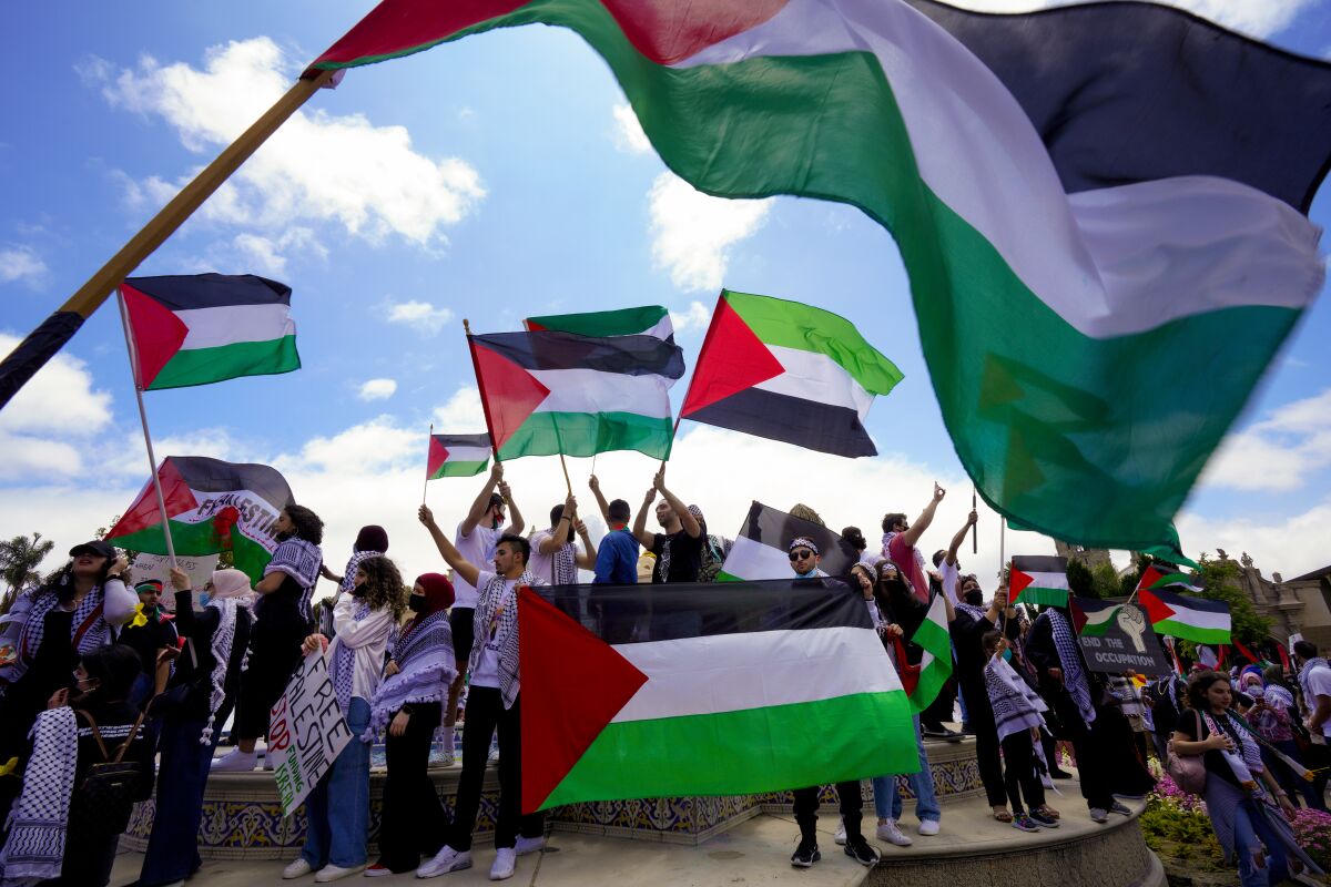 The Palestinian Youth Movement holds a rally and march at Balboa Park
