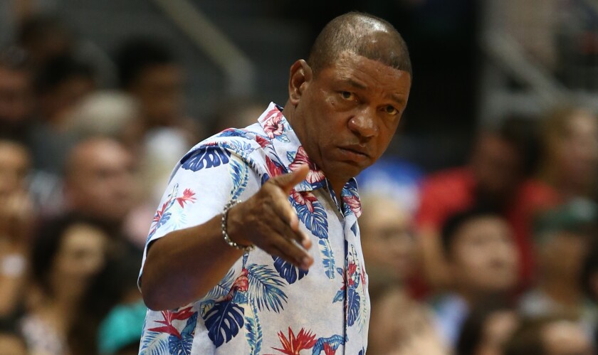 Clippers coach Doc Rivers gestures to his players during an exhibition game against the Sydney Kings on Sept. 30 in Honolulu.