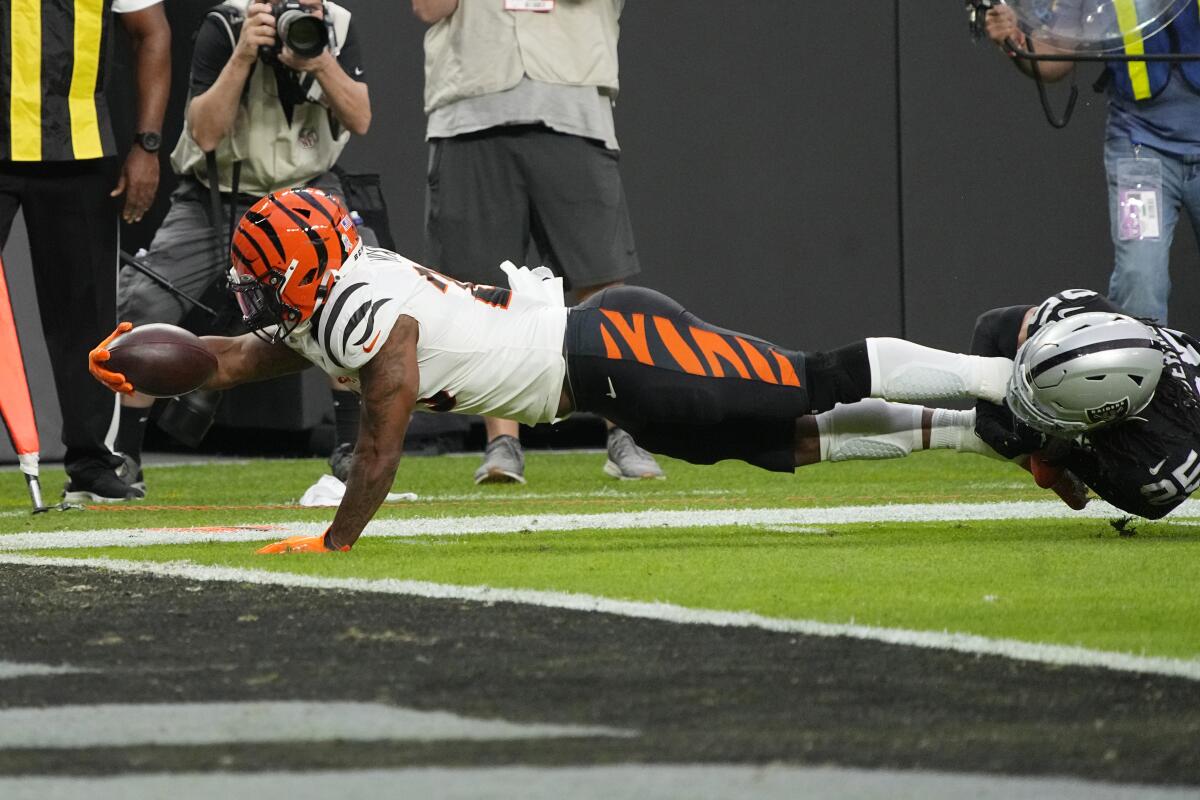 Cincinnati Bengals running back Joe Mixon dives for a touchdown against the Las Vegas Raiders.