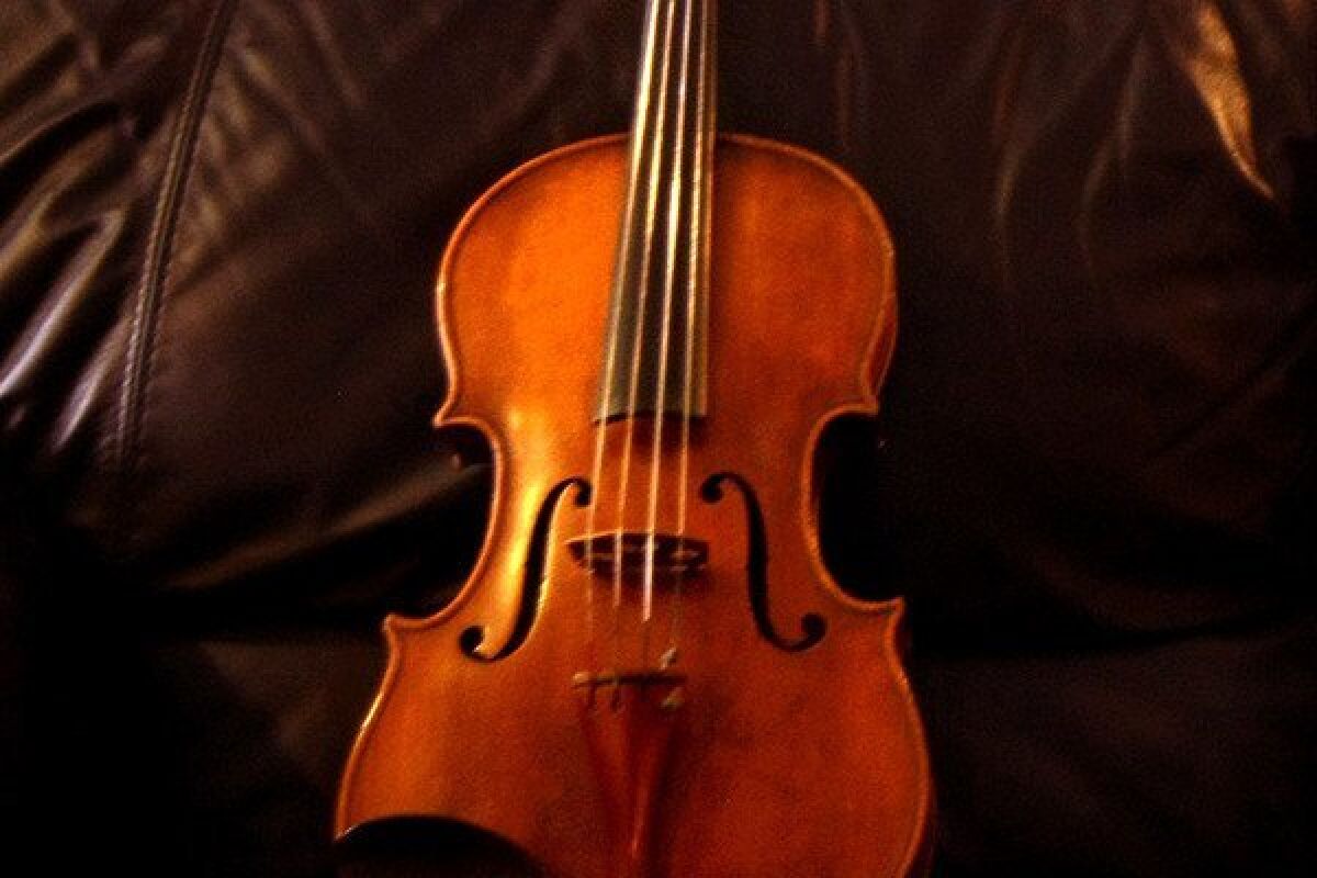 The viola in "Naturale" conveys the soul of Sicilian song.