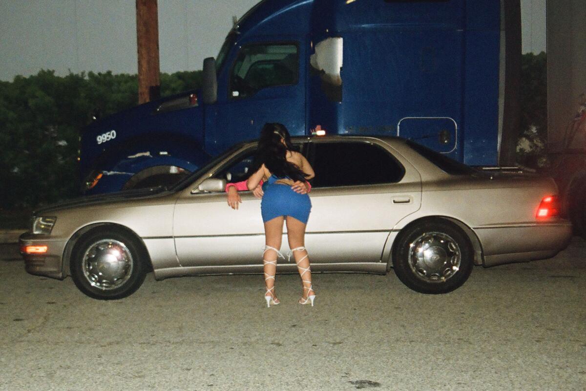 A couple embrace after the party.