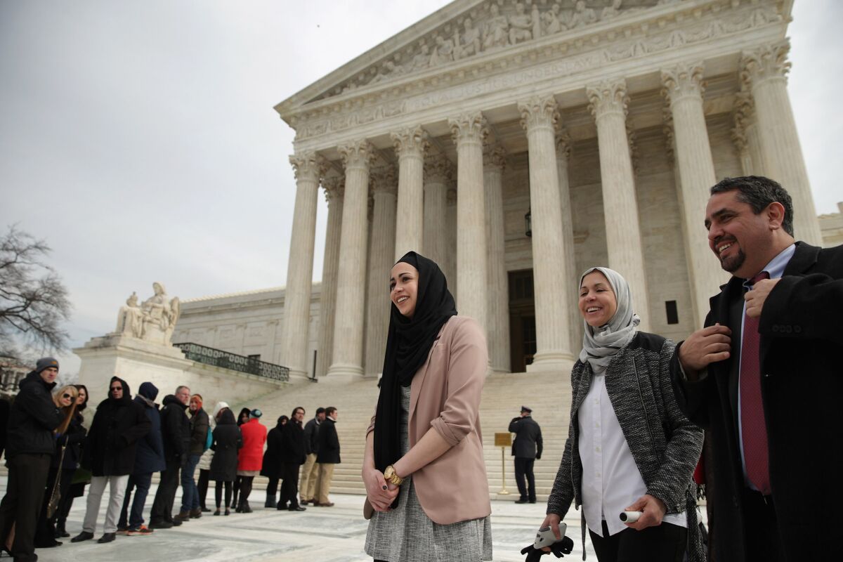 Samantha Elauf, left, outside the Supreme Court in February.