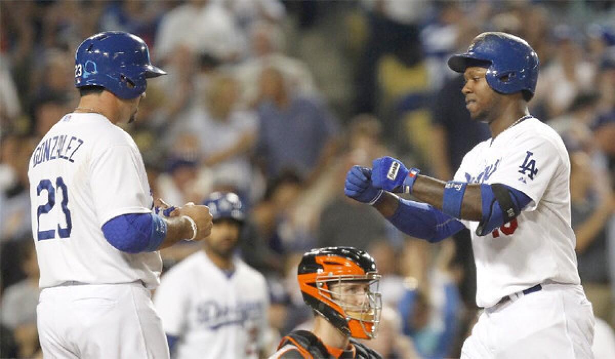 The Dodgers look to lock up the National League West after the All-Star break in part thanks to the return of Hanley Ramirez, right, who is hitting .386 over the last few weeks and has eight home runs in less than 40 games.
