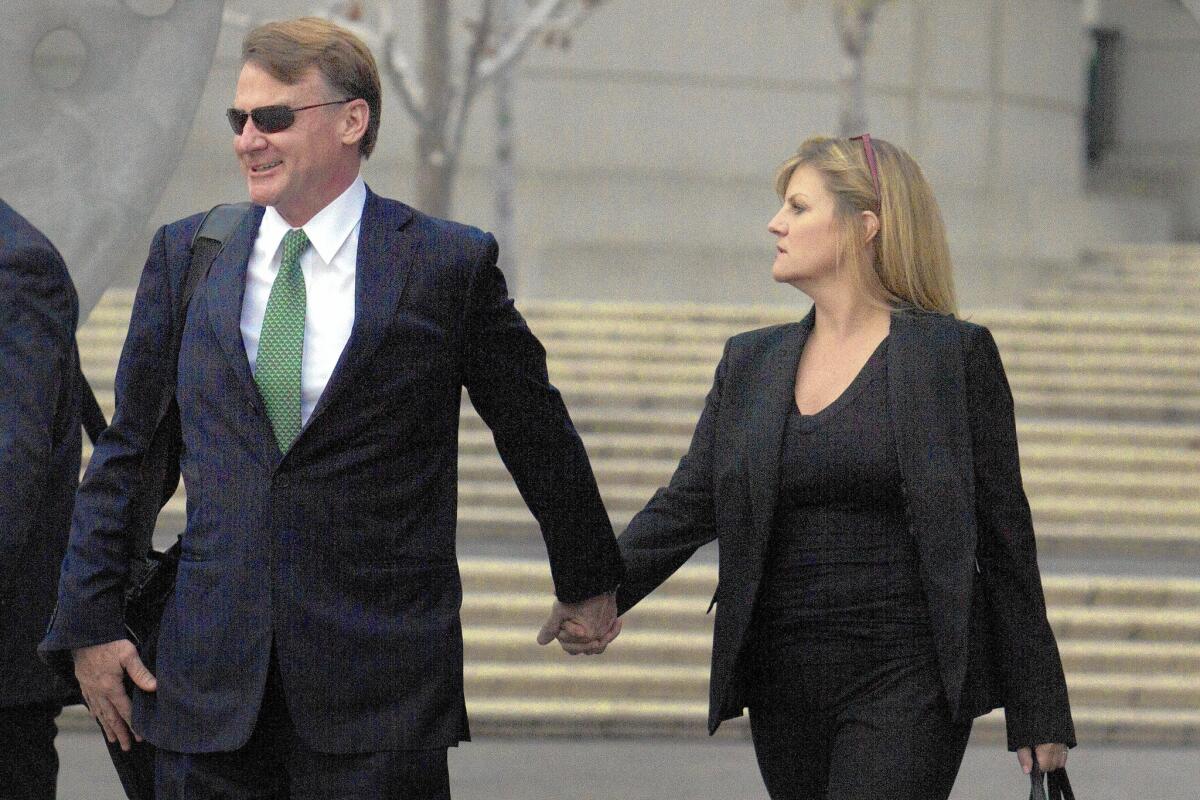 Brian Mulligan, left, after opening statements in one of his lawsuits over his arrest by the LAPD in 2012.