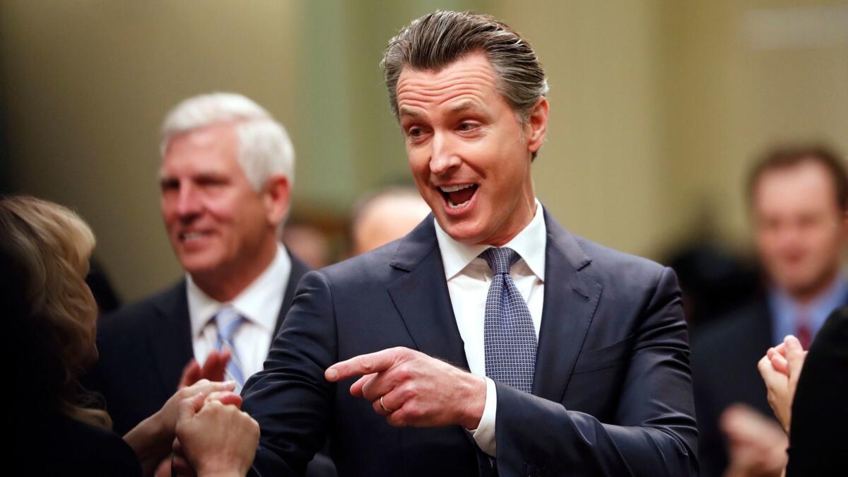 Gov. Newsom is sticking to his campaign promises of scaling back the high-speed rail and water-tunnels projects.