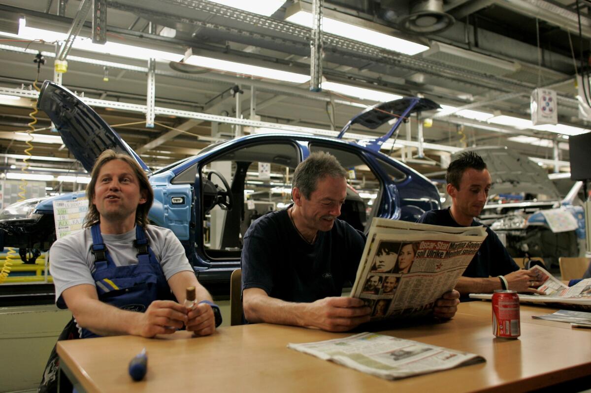 Employees pause at a Ford plant in Saarlouis, Germany.