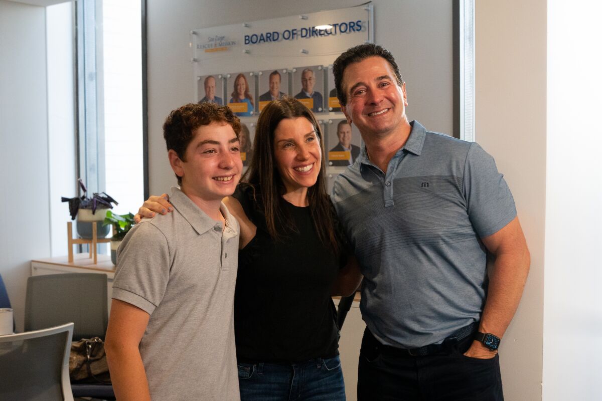Leo Fink with his parents, Jessica and Robert.