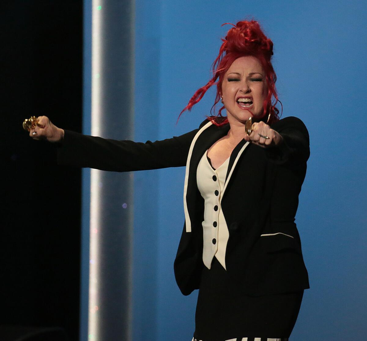 Cyndi Lauper accepts the musical theater album award for "Kinky Boots" at the pre-telecast of the Grammy Awards on Sunday at the Nokia Theatre in Los Angeles.
