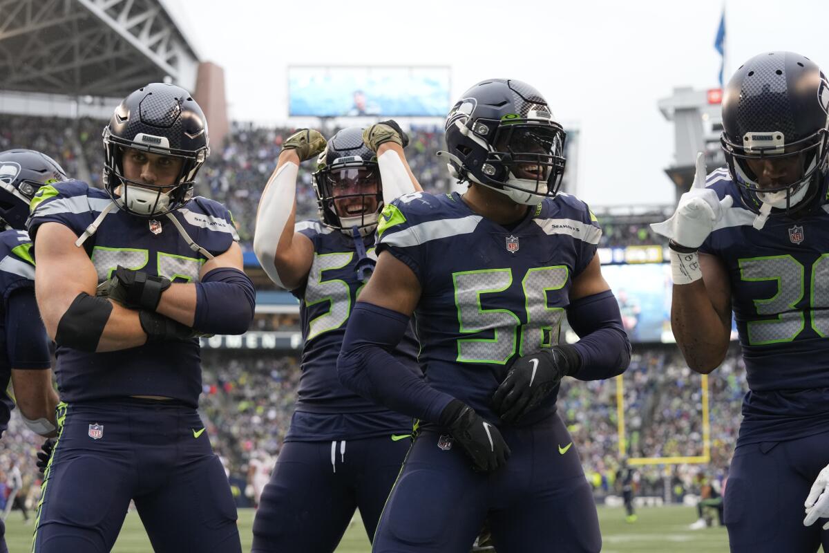Seattle Seahawks players celebrate during a game against the New York Giants on Sunday in Seattle.