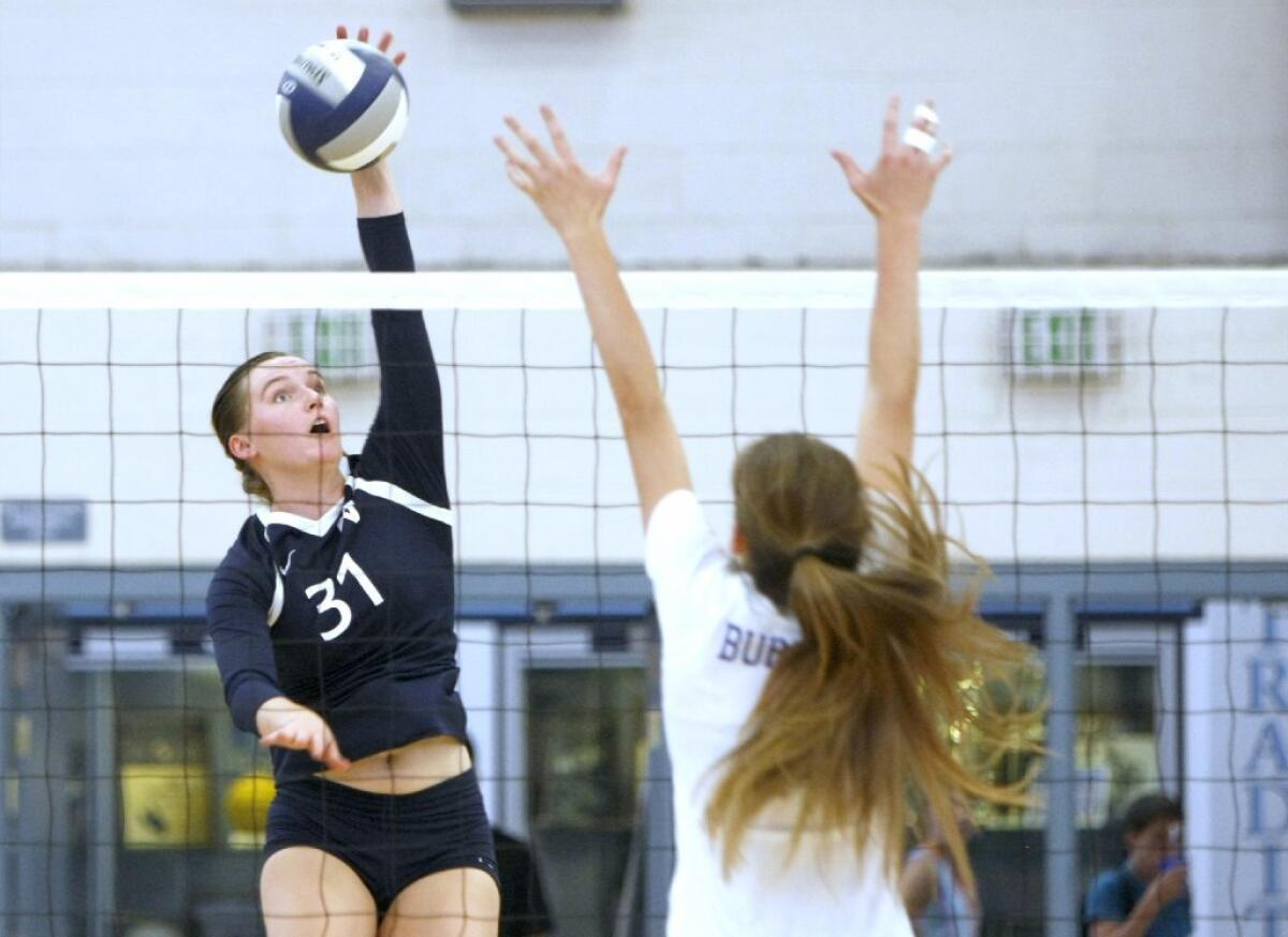 Patty Kerman and the Crescenta Valley High girls' volleyball team defeated Burbank in four games on Tuesday.