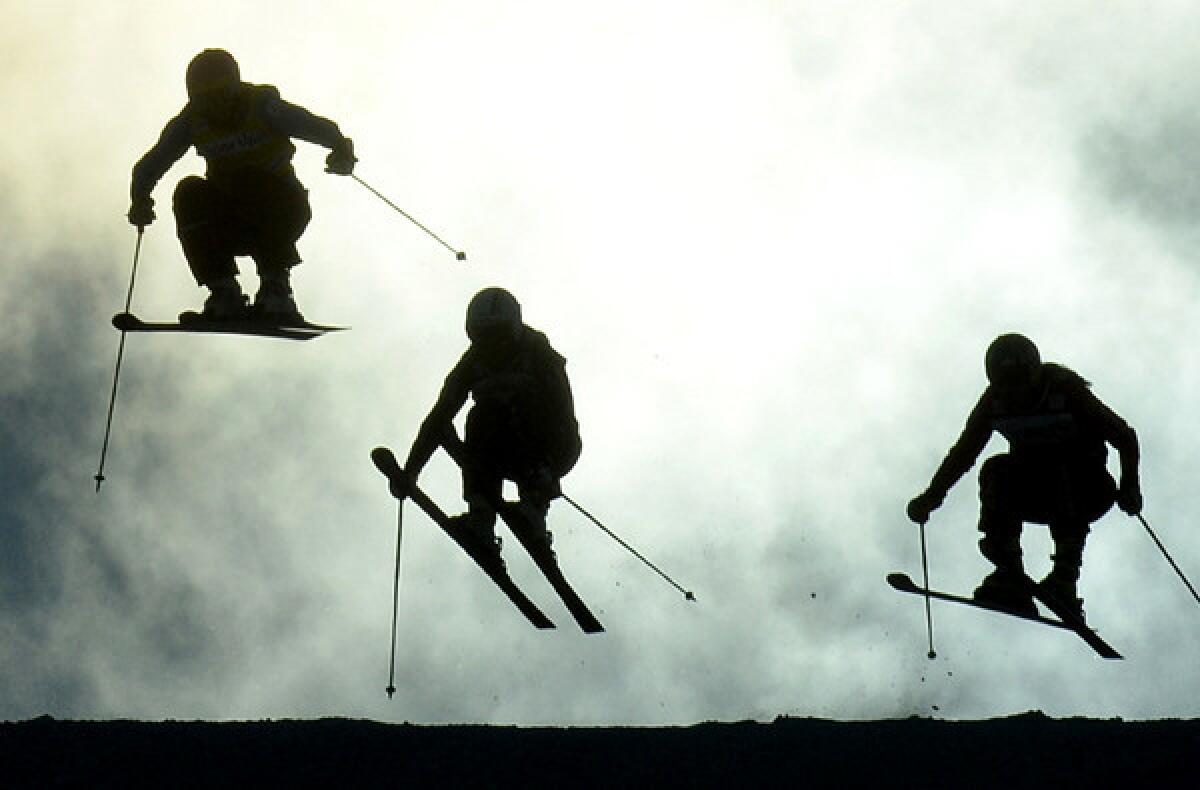 Three competitors take a jump in close quarters during the women's skicross World Cup final last month at Val Thorens in the French Alps.