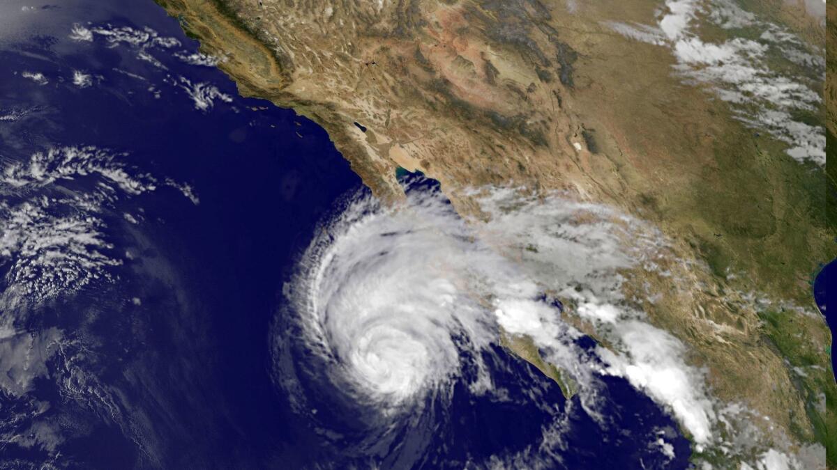 This NASA satellite image shows Tropical Storm Simon off the coast of Mexico in 2014. A Trump administration plan to boost 5G wireless could undermine forecasts based on the subtle signals of atmospheric rivers and other storms, forecasters say.