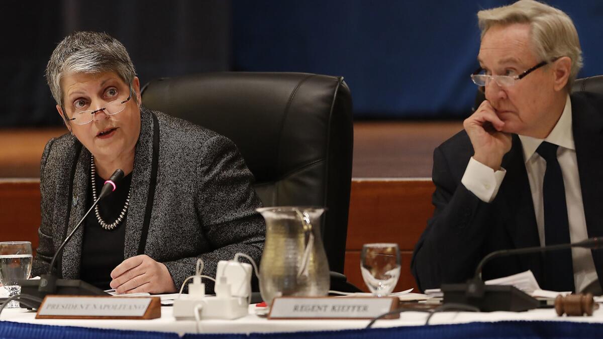 University of California President Janet Napolitano, left, and UC Board of Regents Chairman George Kieffer discuss tuition during a board meeting at UC San Francisco.