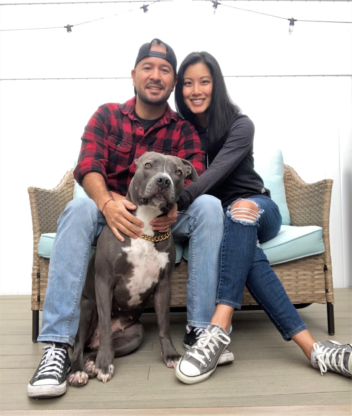 Fountain Valley veteran Giovanni Berdejo, pictured with wife Monica and dog Puna.