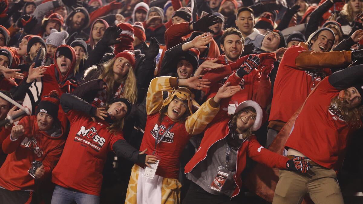 Utah fans celebrate during the second half of the Utes' 45-15 rout of Colorado on Nov. 30 in Salt Lake City.