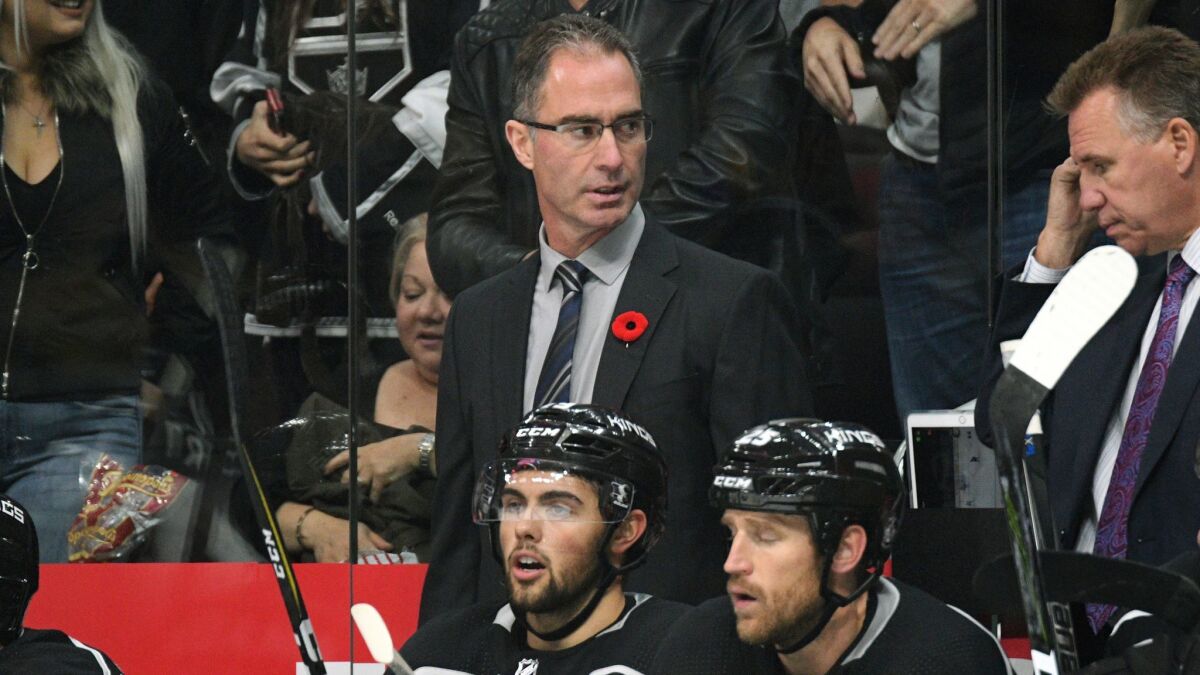 Los Angeles Kings coach John Stevens looks on during a game against the Tampa Bay Lightning.