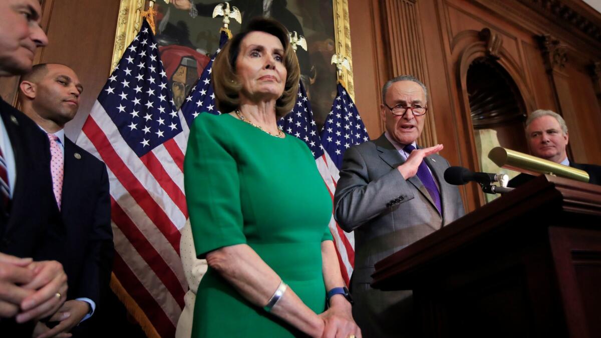 Senate Minority Leader Charles Schumer of N.Y. and House Minority Leader Nancy Pelosi of Calif. speak to reporters on Capitol Hill in Washington on April 28.