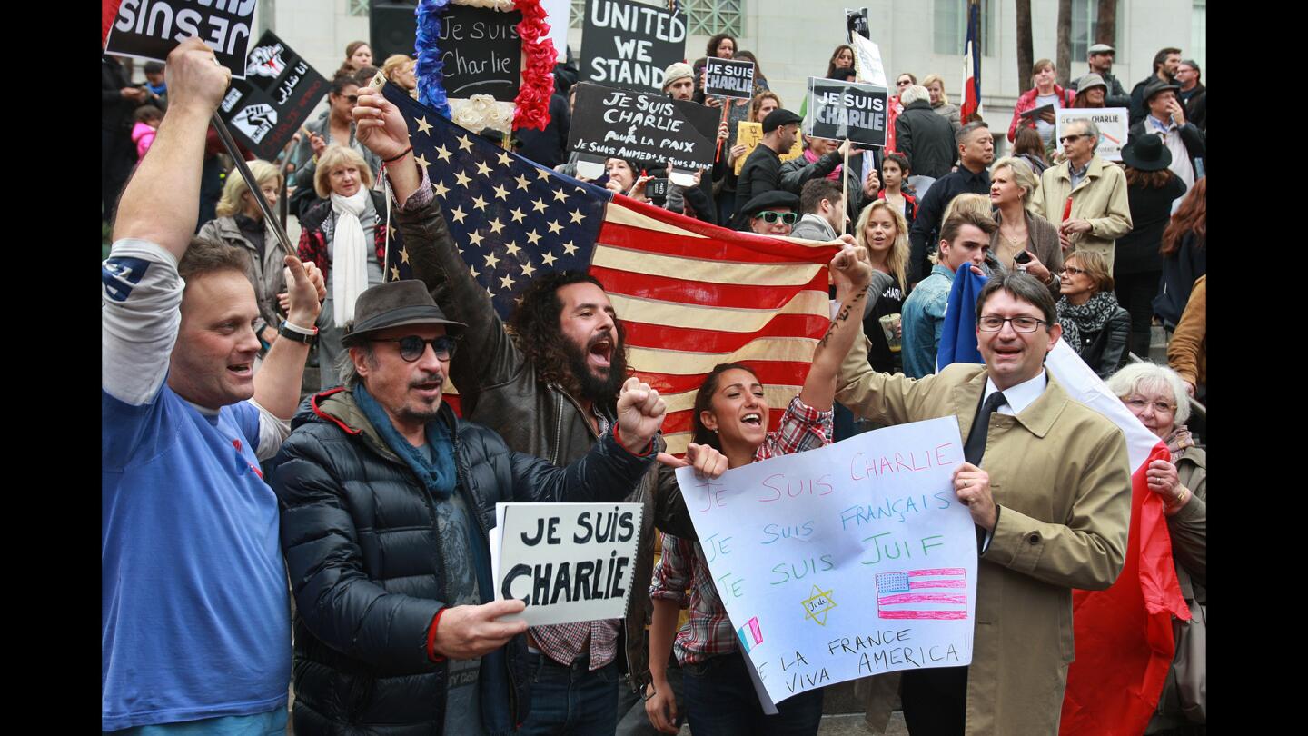 People rally at Los Angeles City Hall on Jan. 11, remembering those killed in the attack on the French magazine Charlie Hebdo and others slain by terrorists