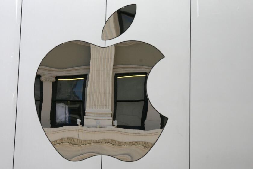 FILE - This Thursday, May 19, 2016, file photo shows the Apple logo on the side of the Apple Union Square store, in San Francisco. Apple reports earnings Tuesday, May 2, 2017. (AP Photo/Eric Risberg)
