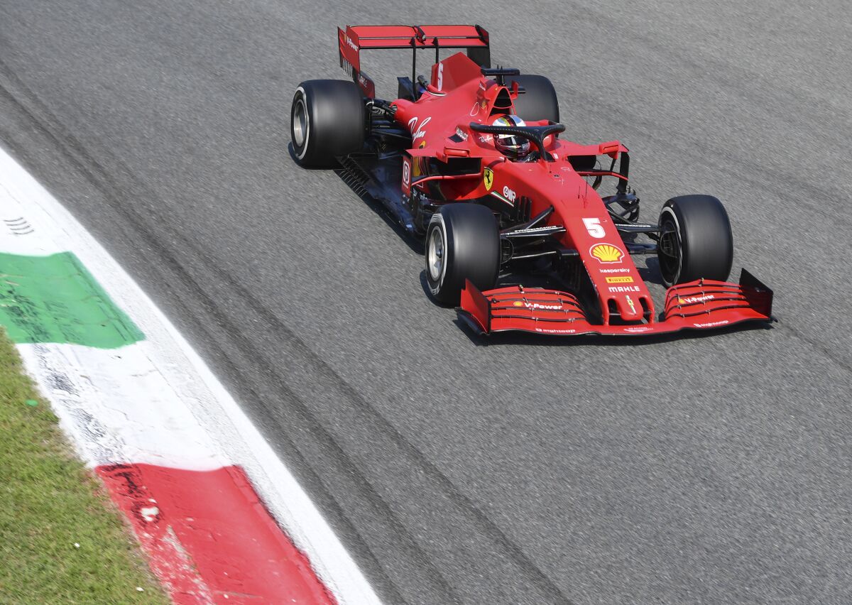 Ferrari driver Sebastian Vettel of Germany steers his car during the Formula One Grand Prix at the Monza racetrack in Monza, Italy, Sunday, Sept.6 , 2020. (Jennifer Lorenzini, Pool via AP)