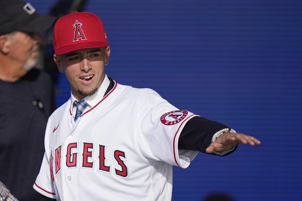 Zach Neto waves after being selected by the Angels.