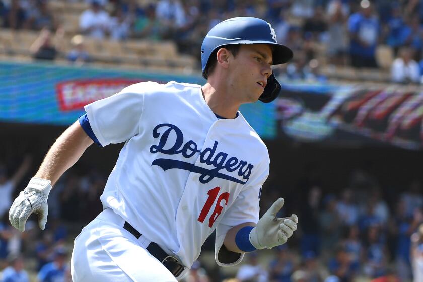 LOS ANGELES, CA - AUGUST 07: Will Smith #16 of the Los Angeles Dodgers runs to first on a pinch hit single in the ninth inning against the St. Louis Cardinals at Dodger Stadium on August 7, 2019 in Los Angeles, California. (Photo by Jayne Kamin-Oncea/Getty Images)