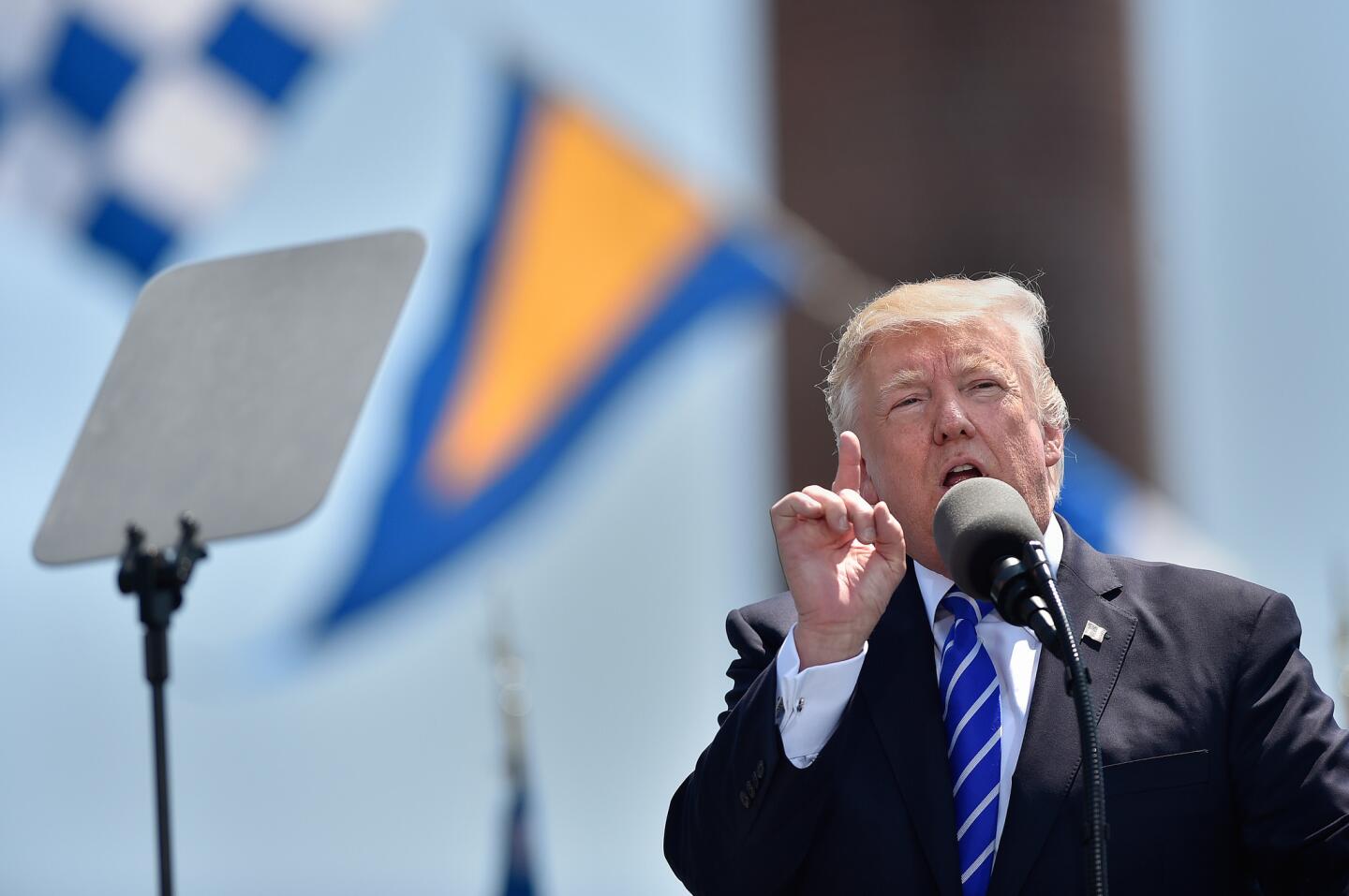 President Donald Trump gives the commencement address at the United States Coast Guard Academy's 136th commencement exercises Wednesday.