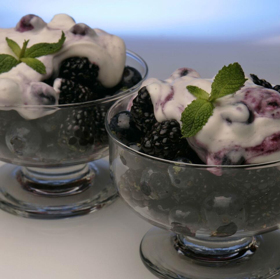 Blueberry fool on a berry fruit salad is a fresh, bright dessert.