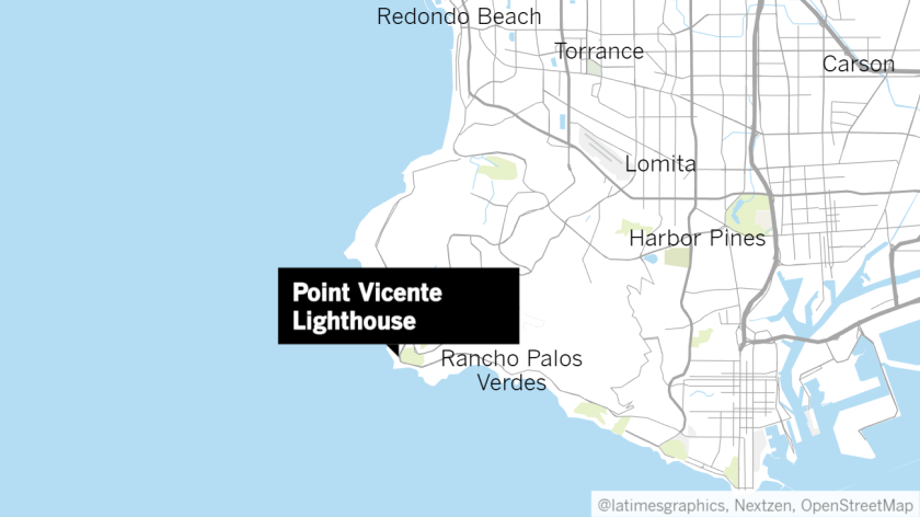 Firefighters set up a staging area near the Point Vicente Lighthouse, near where an airplane might have descended into the ocean.