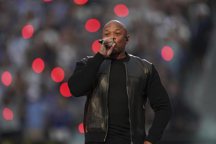 Dr. Dre performs during halftime of the game between the Los Angeles Rams and Cincinnati Bengals in Super Bowl 56, Sunday, Feb. 13, 2022 in Inglewood, Calif. (AP Photo/Doug Benc)