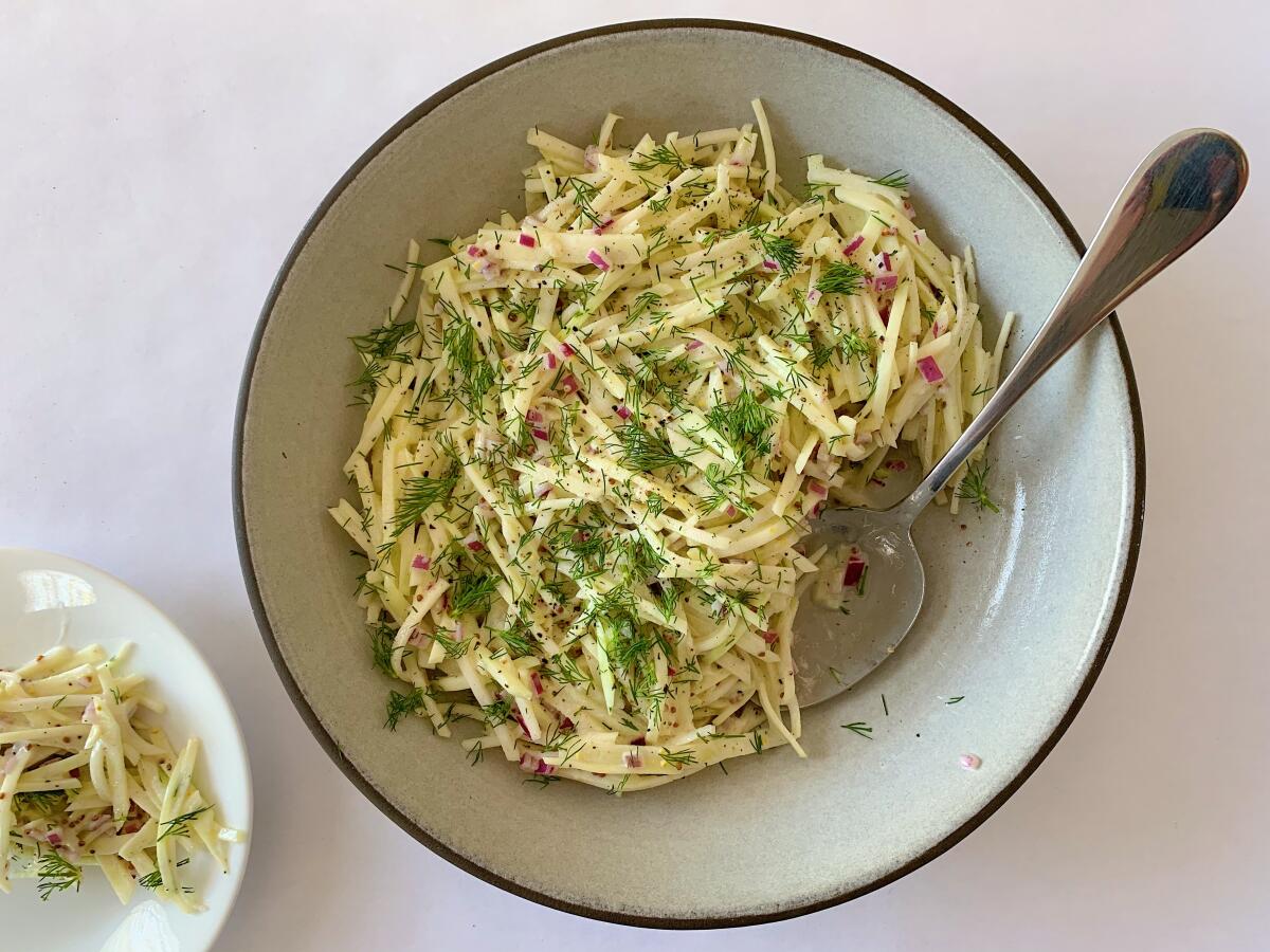French rémoulade slaw made with julienned kohlrabi and apple in a yogurt dressing.