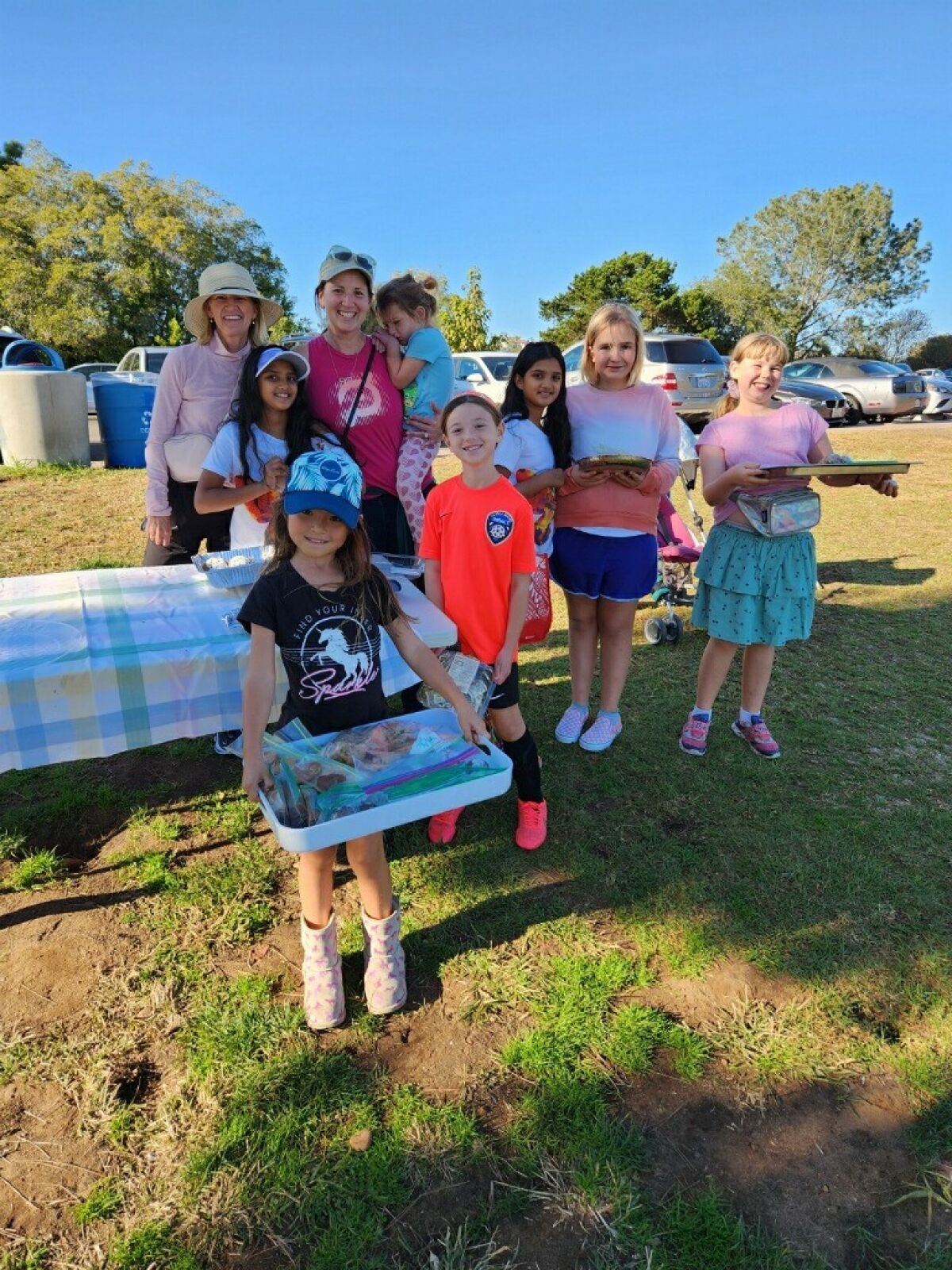 Members of the La Jolla team of Girls on the Run raised money for area causes during a bake sale.