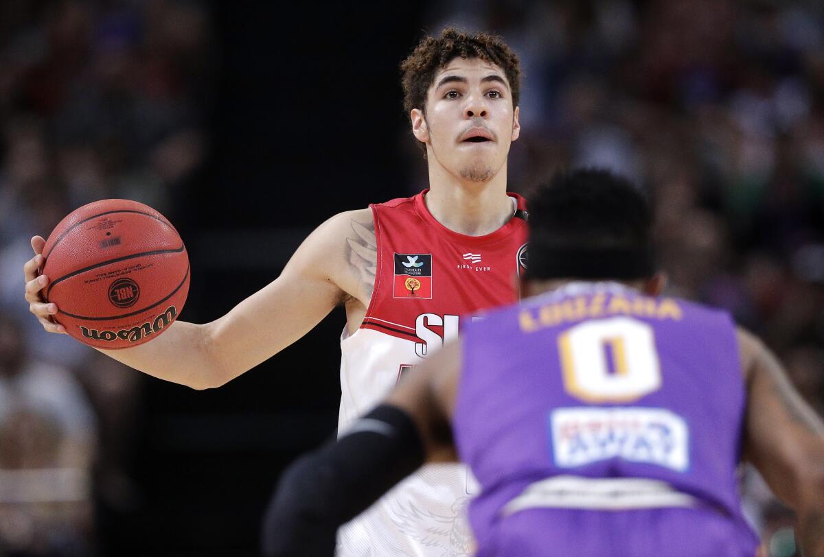 LaMelo Ball of the Illawarra Hawks controls the ball against the Sydney Kings.