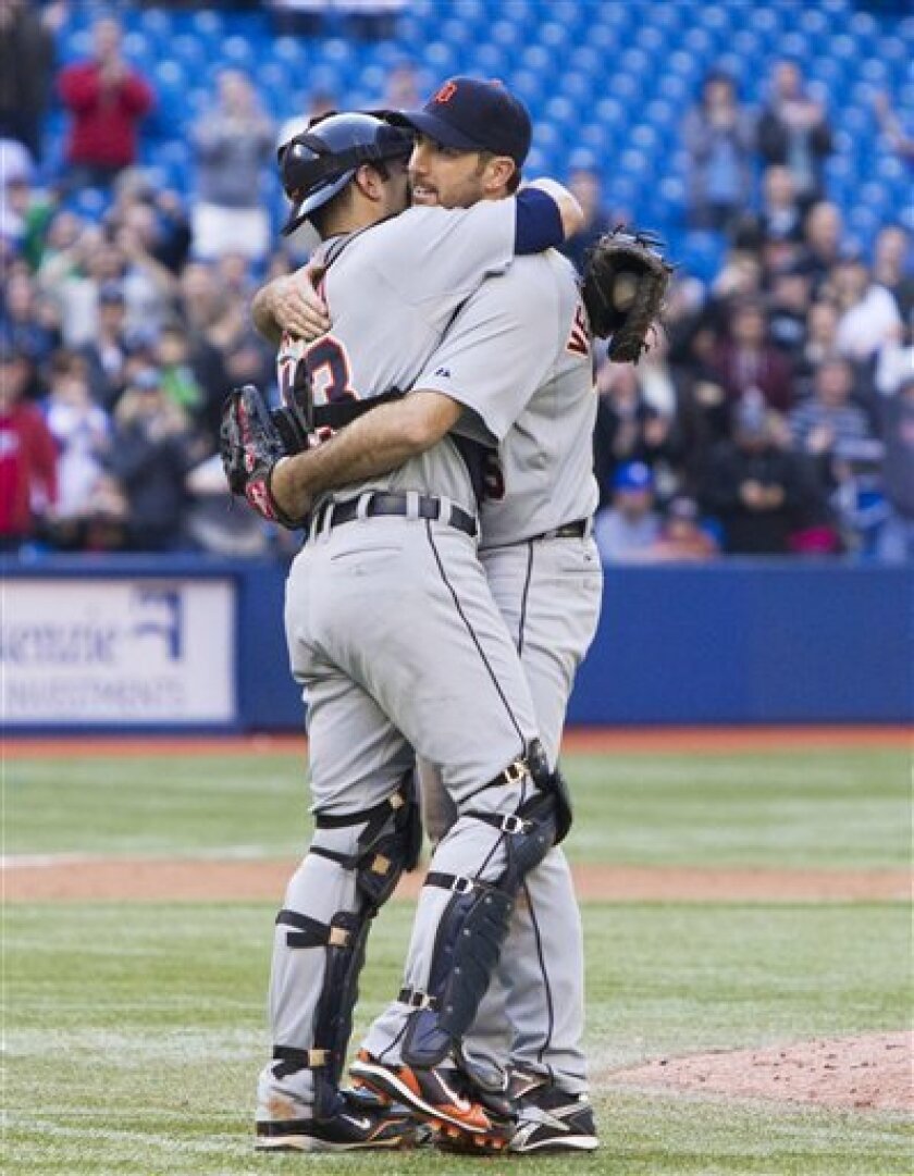 Detroit Tigers pitcher Justin Verlander, right, and catcher Alex Avila celebrate Verlander's no-hitter against the Toronto Blue Jays in Toronto on Saturday, May 7, 2011. (AP Photo/The Canadian Press, Darren Calabrese)
