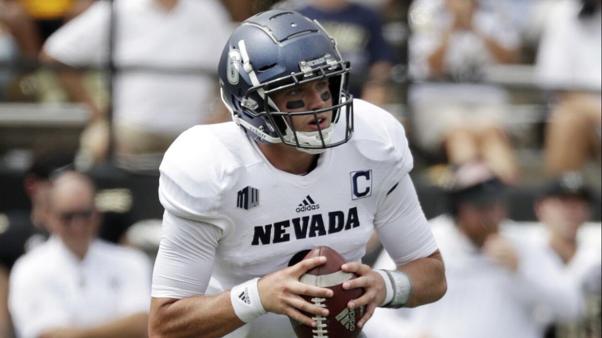 Nevada quarterback Ty Gangi looks to pass during a game against Vanderbilt on Sept. 8, 2018.