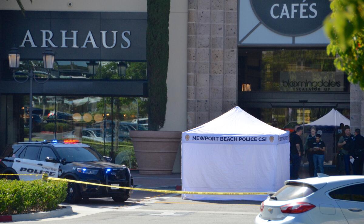 A white tent was set up nearby the Bloomingdale's at Fashion Island.