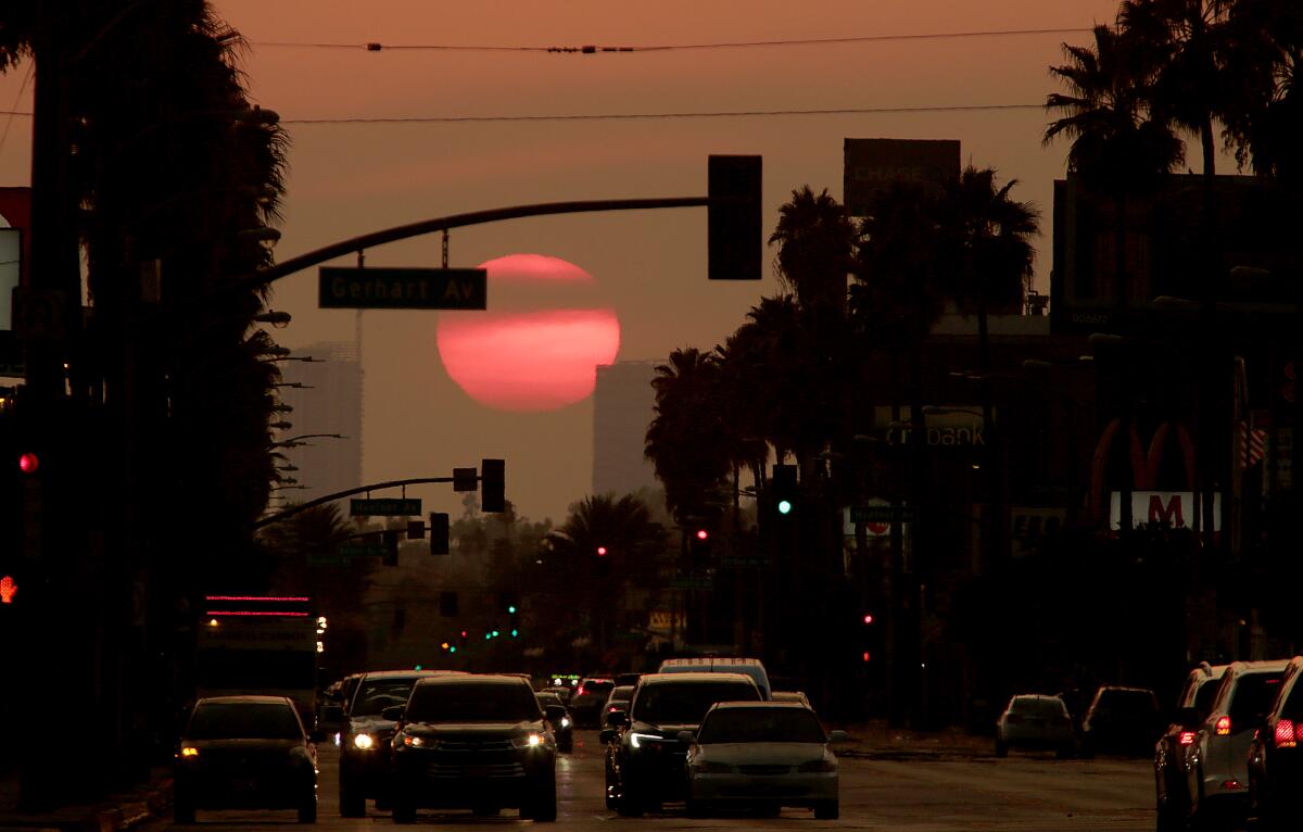 The sun sets on Whittier Boulevard in East Los Angeles.