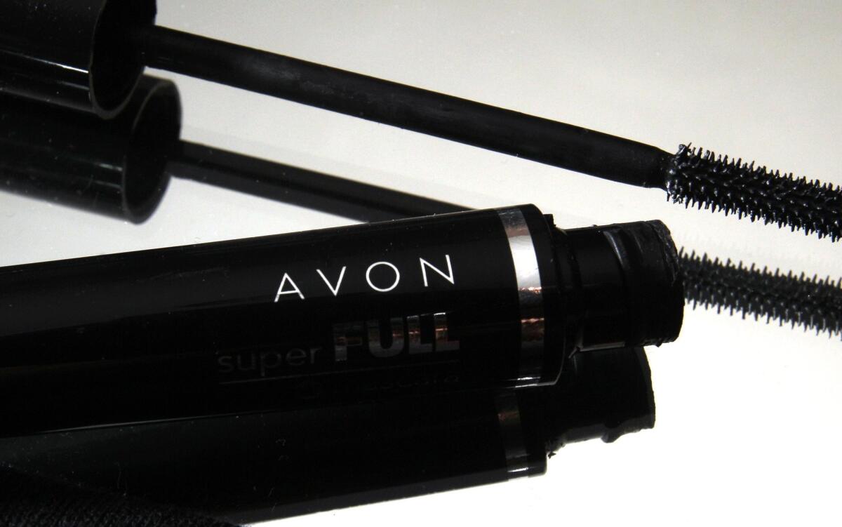 A container and brush of Super Full mascara by Avon is seen in North Andover, Mass.