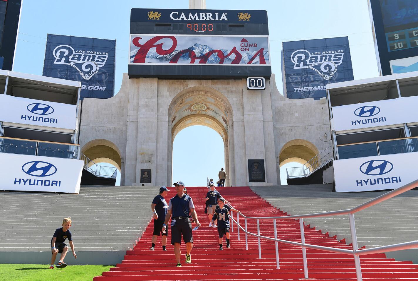 Sep 18, 2016; Los Angeles, CA, USA; Fans enter the stadium at the peristyle end of Los Angeles Memorial Coliseum before the game between the Seattle Seahawks and the Los Angeles Rams. Mandatory Credit: Jayne Kamin-Oncea-USA TODAY Sports ** Usable by SD ONLY **