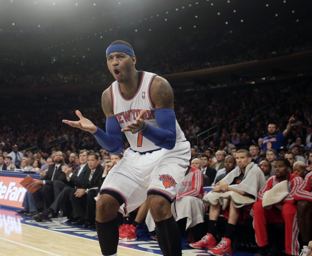 New York Knicks small forward Carmelo Anthony reacts to a call during Thursday's 109-106 loss to the Houston Rockets.